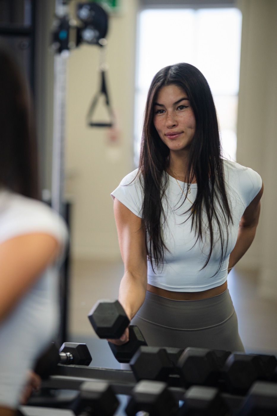 Charlotte training with a dumbbell — start training